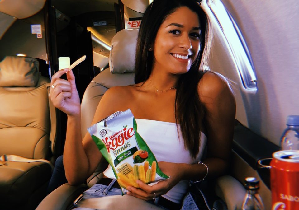Eating snacks on a private jet.