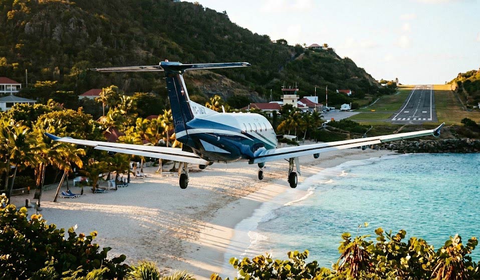 Private Jet Landing At St. Barths Airport Over The Beach