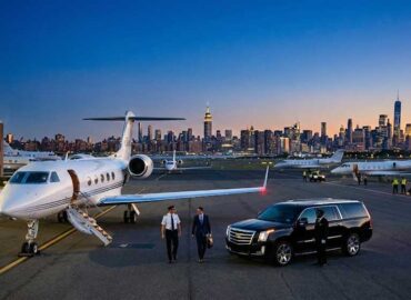 Teterboro Airport FBO private jet NYC skyline.