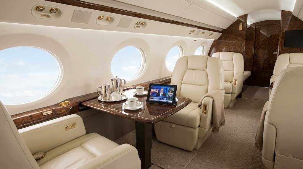 Spacious Private Jet Cabin Interior Designed For Productivity And Comfort.