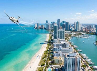 Aerial view of Miami skyline representing Miami private jet charter destinations.