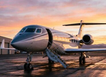 Exterior of a private jet prepared for departure demonstrating private jet benefits.